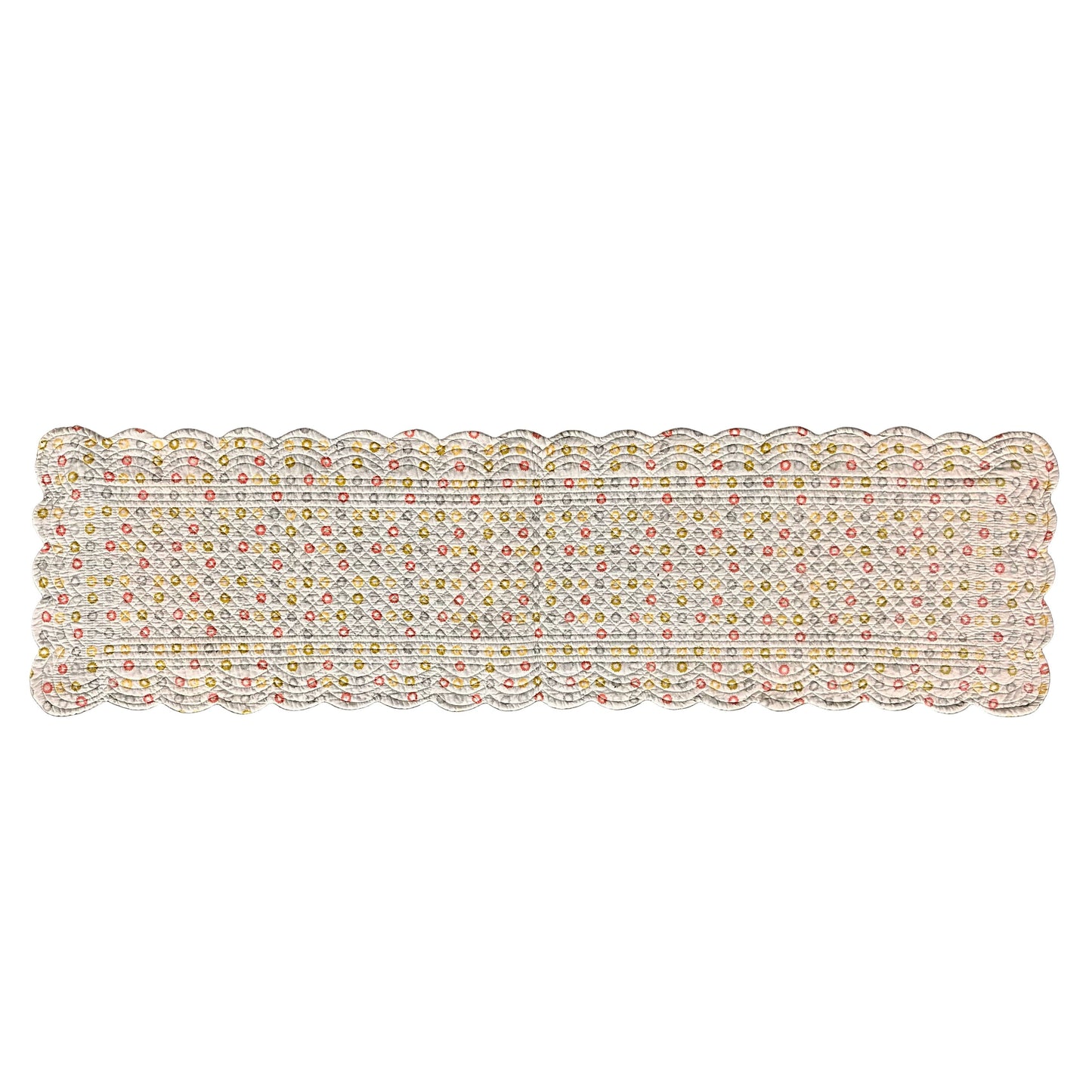 A rectangular scalloped table runner with colorful polka dots a white background.