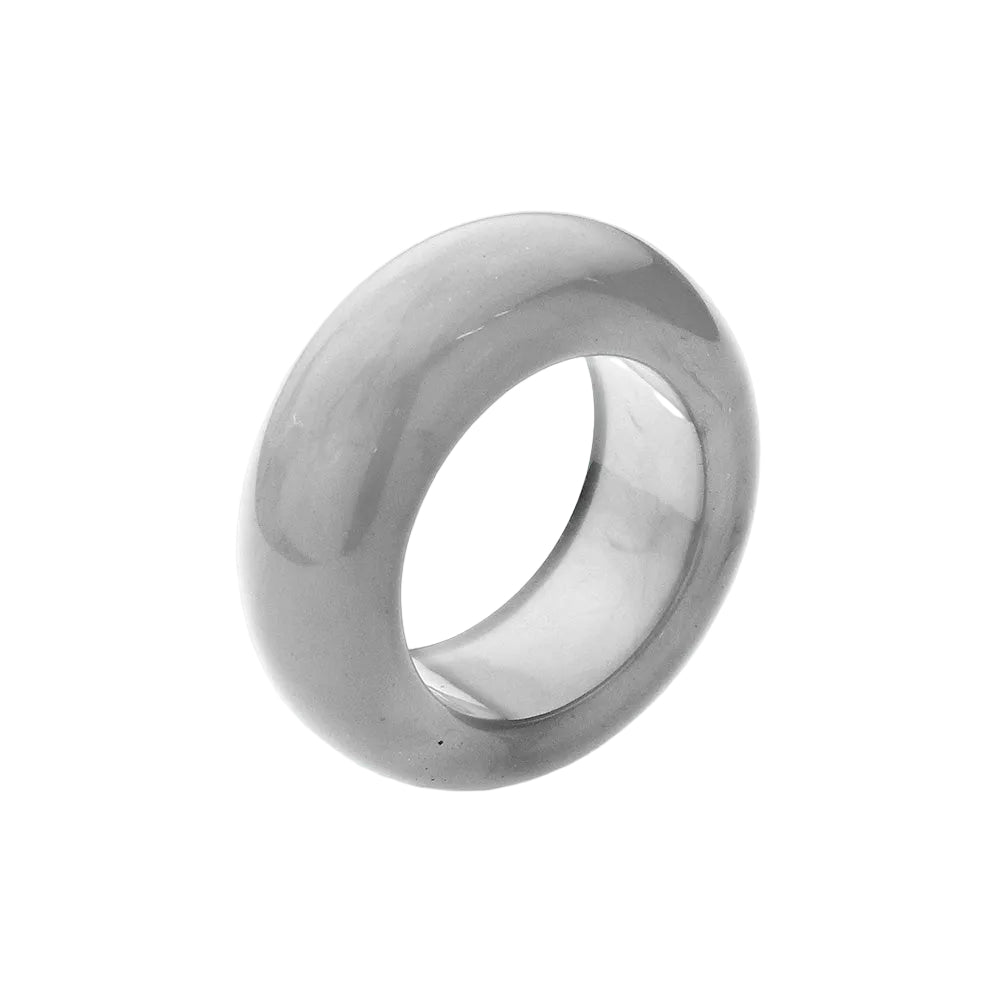 A bold gray resin ring with a smooth surface finish, displayed against a white background.