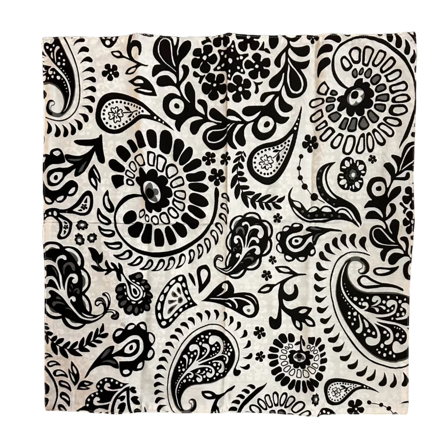 A square fabric item, a napkin, featuring a black and white paisley pattern, laid flat on a white background.