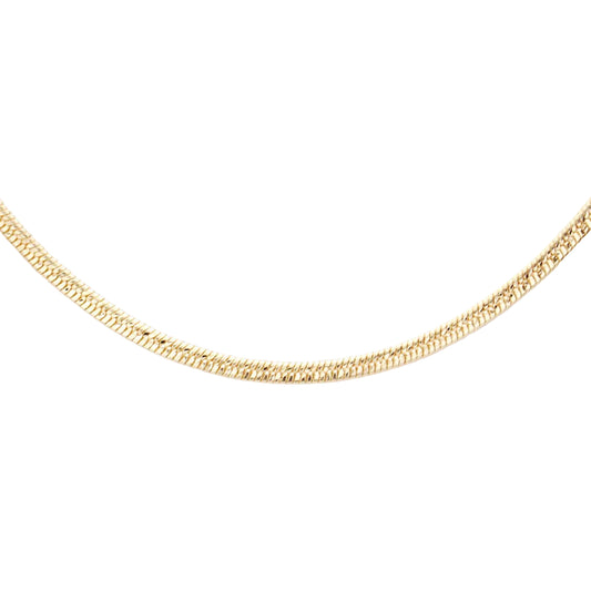 A close-up of a gold chain necklace against a plain white background.