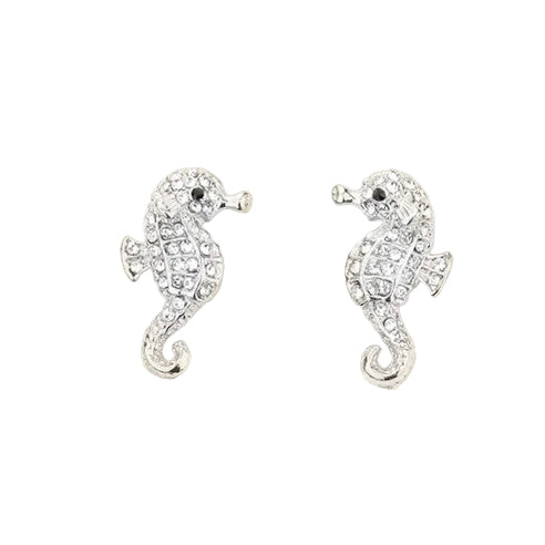 A pair of silver-colored crystal pave seahorse stud earrings on a white background.