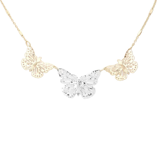 A delicate butterfly necklace featuring three butterfly charms: two in gold-tone metal and one in silver-tone metal, suspended from a fine gold chain against a plain white background.