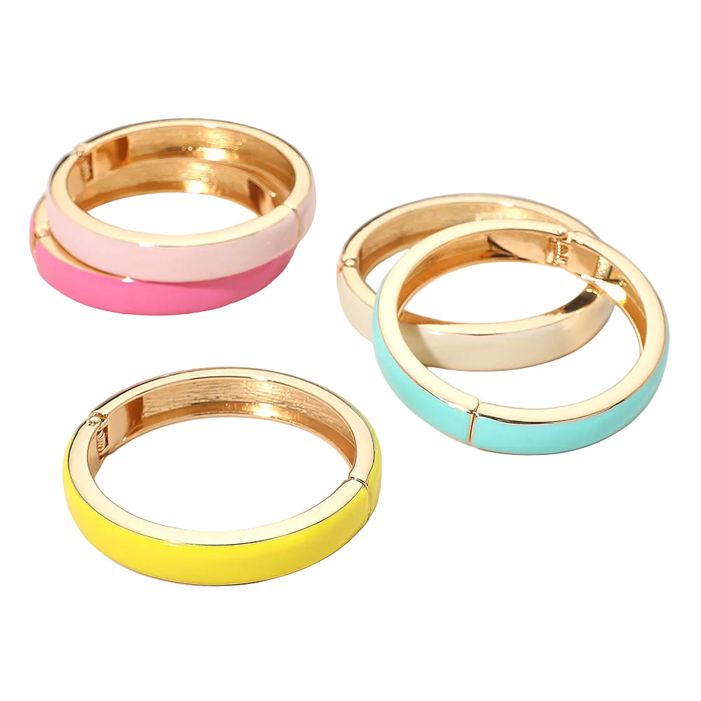 Colorful hoop enamel bracelets on a white background
