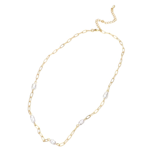 A gold-colored necklace with freshwater pearl stations, displayed against a white background.