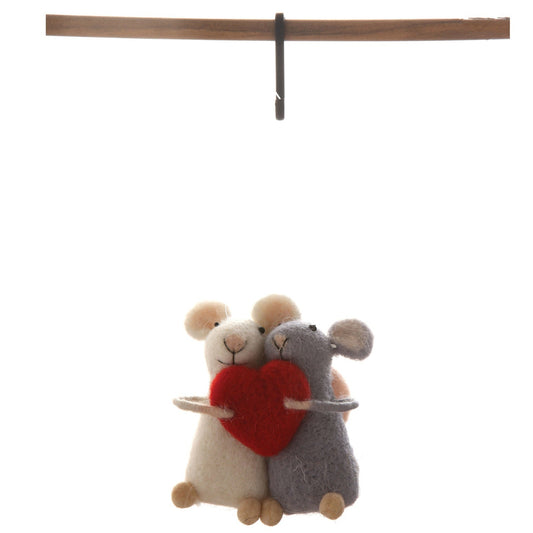 A hanging plush mouse mobile with two mice hugging a red heart, suspended from a wooden bar against a white background.
