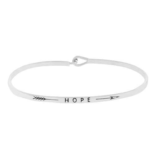 A thin metal hook bracelet with 'HOPE' written on it, in a rhodium color finish.