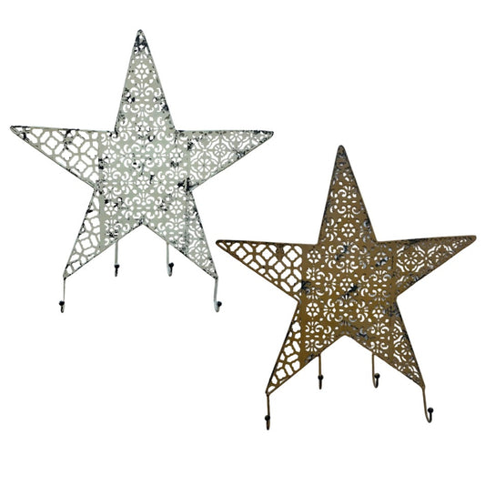 Two decorative star-shaped metal wall pieces with intricate cutout patterns. One star is off white and the other is a deep mustard, each with four hanging hooks below.