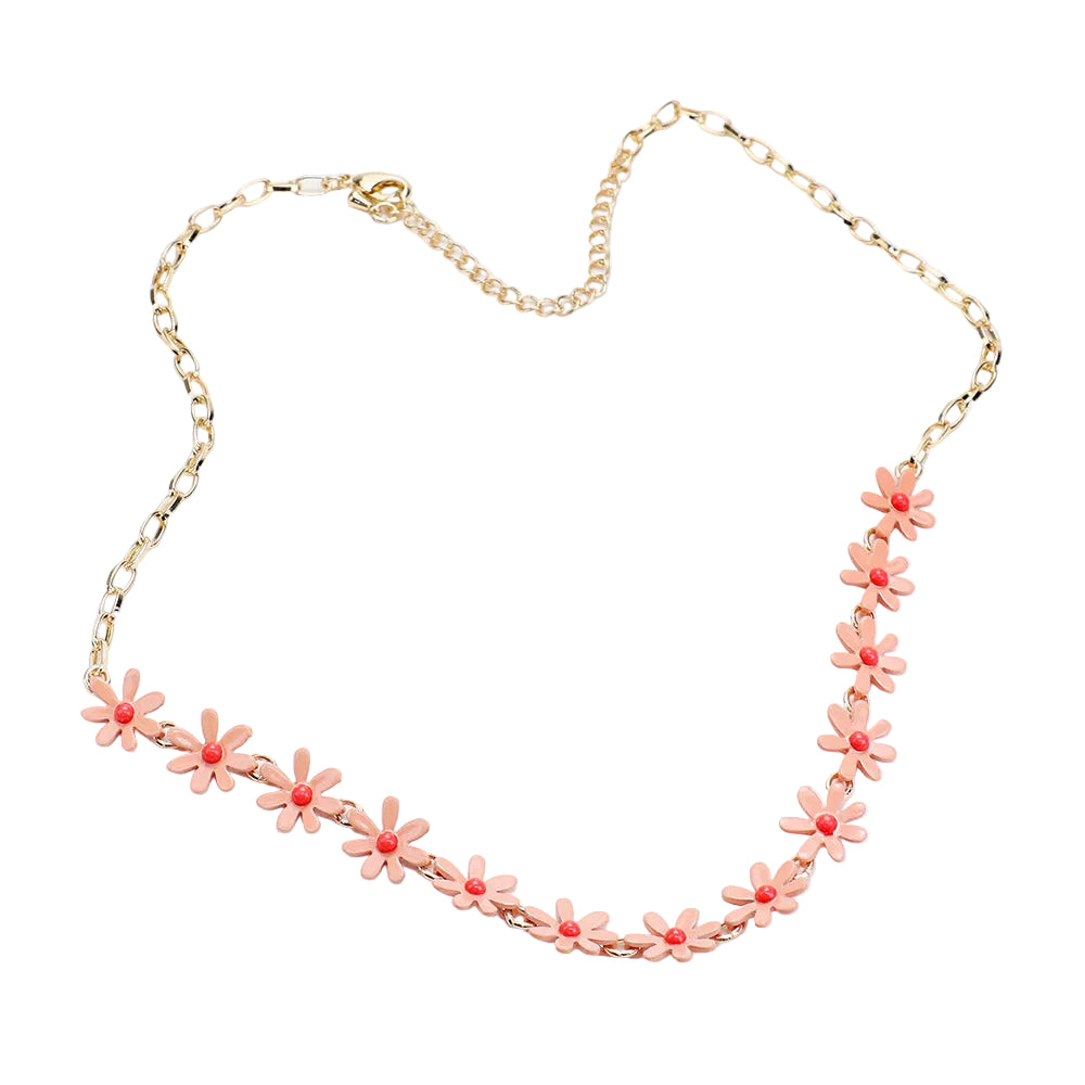 A gold chain necklace featuring a row of small pink daisy flowers with gold centers, displayed on a clean white background.