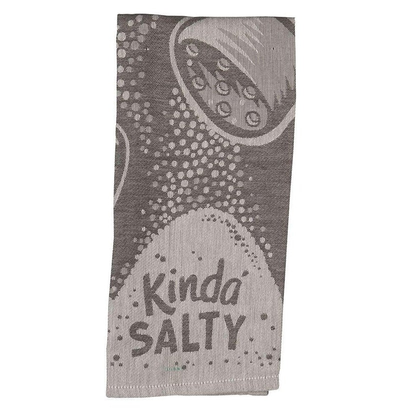A rectangular kitchen towel with a gray and white graphic print of a salt shaker and the words 'Kinda SALTY' in a retro font, shown against a plain white background.
