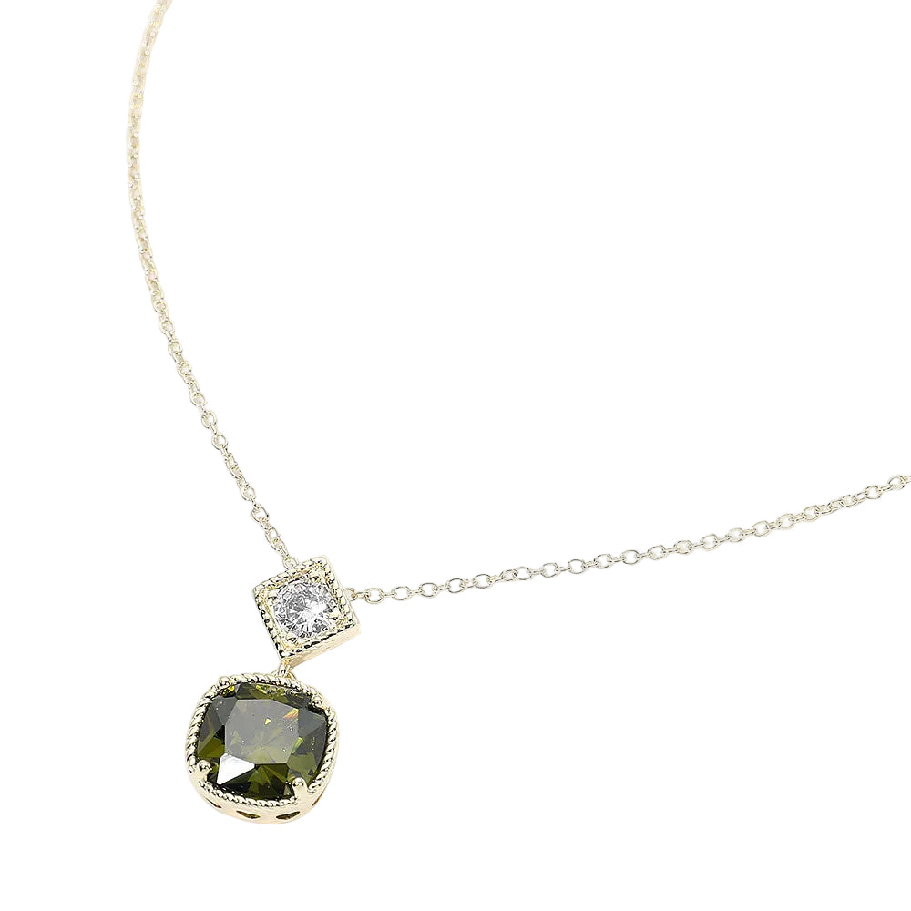 Necklace with a green gemstone pendant on a white background
