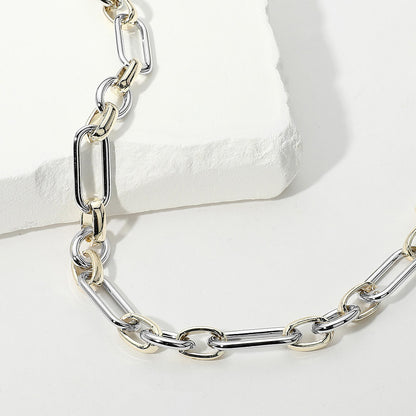 Silver chain necklace on a white background