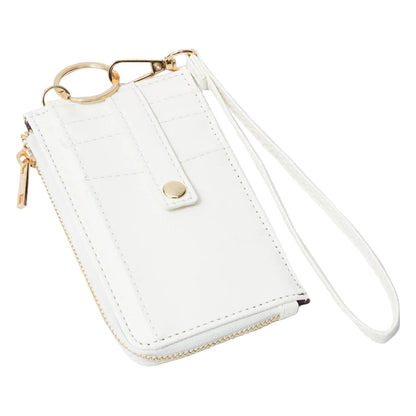 White leather cardholder with gold accents on a white background
