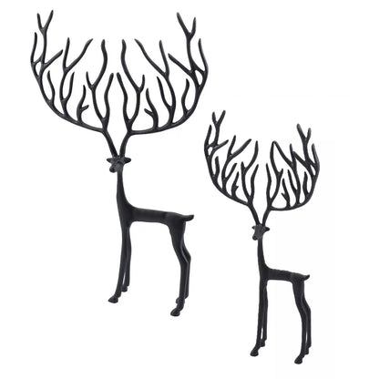 Shop elegant black metal reindeer with dramatic branching antlers. Perfect for Christmas, winter woodland displays, and rustic holiday décor. Sold separately.