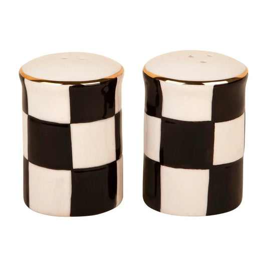 Black and white checkered ceramic salt and pepper shaker set finished with elegant gold-tone rims. A playful, stylish addition to any table or kitchen.