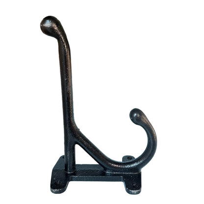 A black cast iron coat rack hook with a textured finish, featuring a vertical upright hook and a lower horizontal hook, mounted on a base against a plain white background.