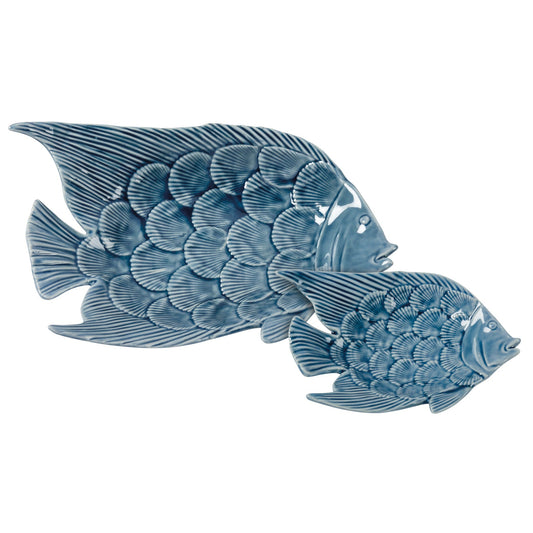 Two decorative fish-shaped ceramic plates in a blue and white glaze, featuring detailed scale patterns, shown on a plain white background.
