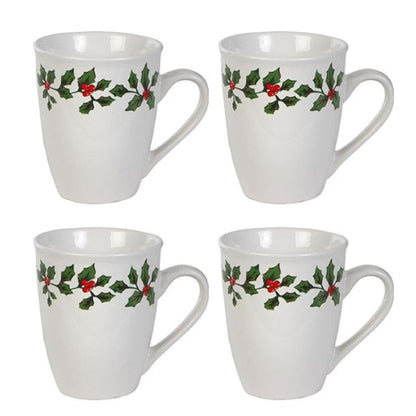 Four white mugs with holly berry design on a white background