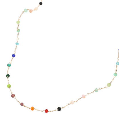 Necklace with multicolored beads on a white background