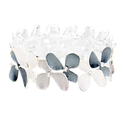 A stretchable metal bracelet with a floral pattern, featuring gray and silver colors.
