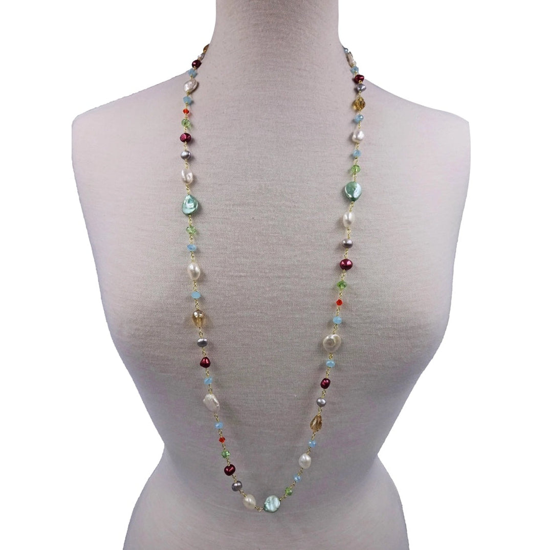 Long rosary-style necklace featuring cultured pearls and colorful crystals.