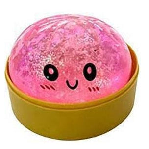 Pink glowing ball with a face in a yellow container on a white background