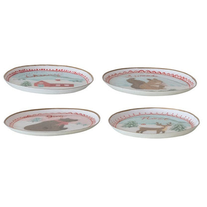Side view of four shallow oval enameled metal winter scene dishes arranged in two rows.