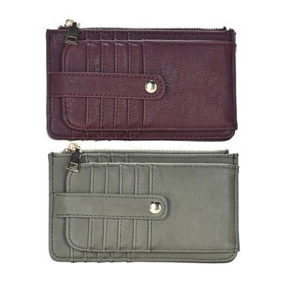 Two wallets, one purple and one olive green, on a white background