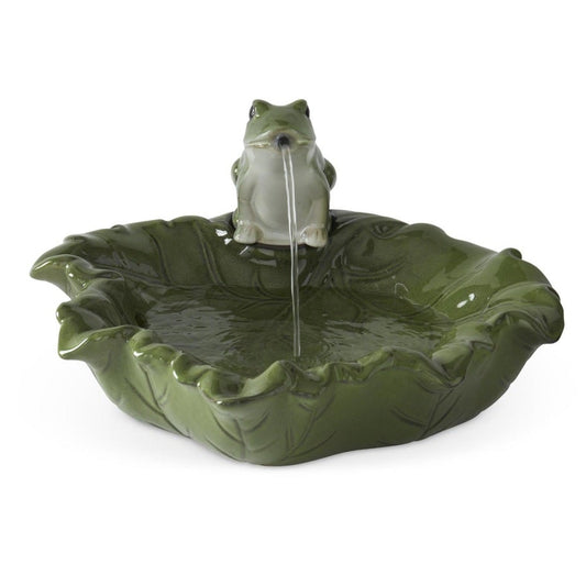A decorative fountain with a frog perched on a leaf-shaped basin, shown on a plain white background.