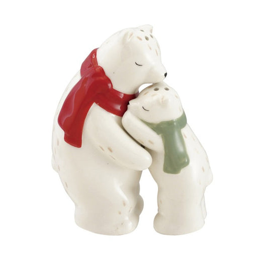 Ceramic salt and pepper shakers.  Two polar bears hugging, with the larger bear wearing a red scarf and the smaller bear wearing a green scarf, set against a plain white background.