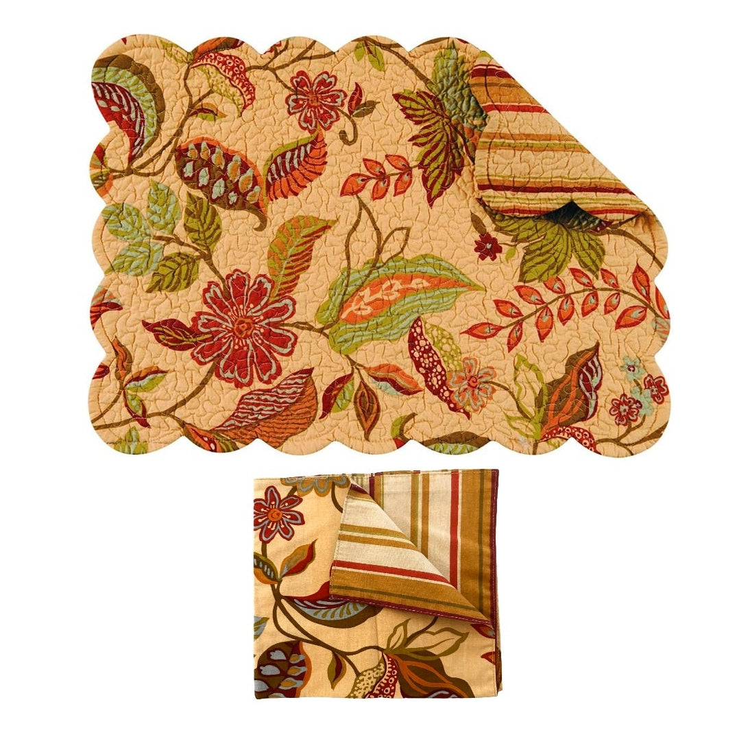 Folded placemat and napkin with a floral and geometric pattern in warm autumn tones, shown on a plain white background.