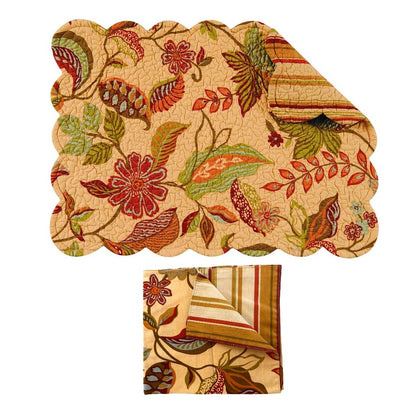 Folded placemat and napkin with a floral and geometric pattern in warm autumn tones, shown on a plain white background.