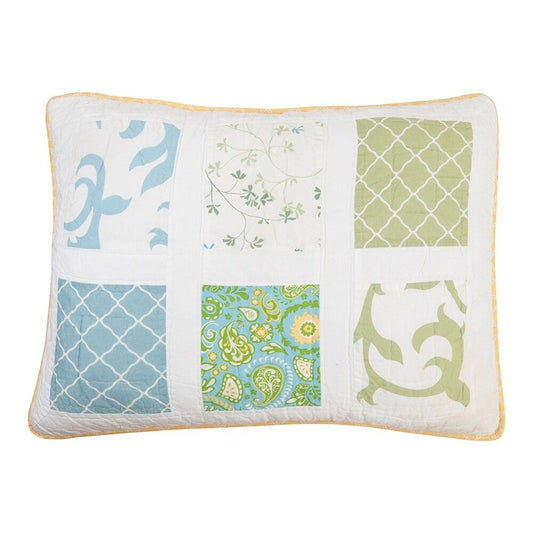 A square decorative throw pillow featuring a six-panel patchwork design in shades of blue, green, and yellow on a white background, finished with a light beige piped edge.