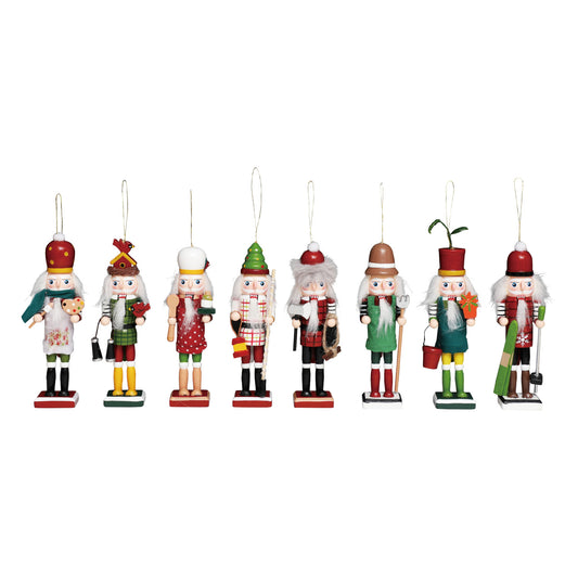 A set of eight traditional wooden nutcracker ornaments in various holiday and winter-themed outfits, arranged in a row against a plain white background.