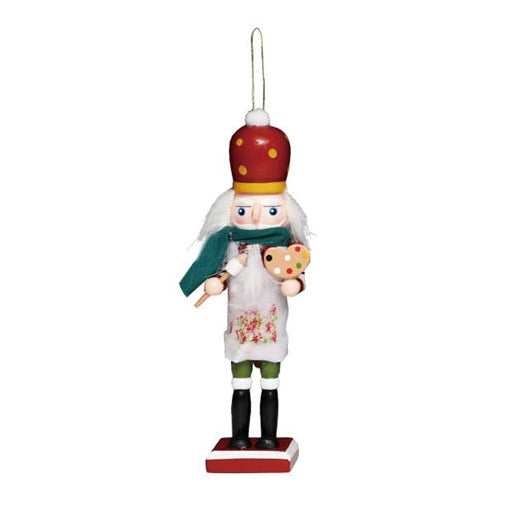 Wood painter nutcracker Christmas ornament holding a paintbrush and colorful artist palette.