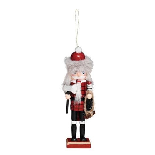 A small woodsman Christmas nutcracker ornament hanging by a white string, with a red and white hat, red and black outfit, and white beard, shown against a plain white background.