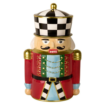Add holiday magic with our ceramic Nutcracker Cookie Jar! Features a festive red uniform and removable black and white checkered hat.