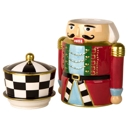 Add holiday magic with our ceramic Nutcracker Cookie Jar! Features a festive red uniform and removable black and white checkered hat with a tight seal.