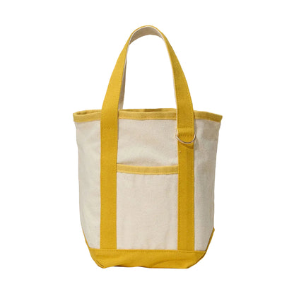 Natural tote bag with mustard yellow accents on a white background