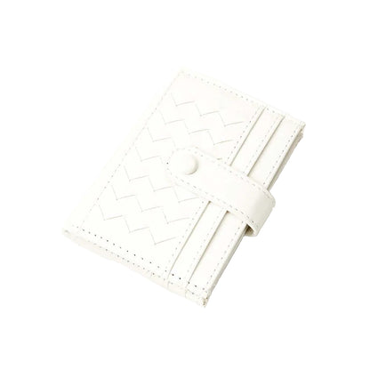 White leather wallet with a textured pattern on a white background