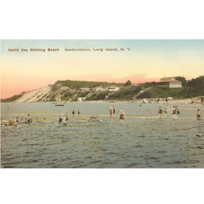A postcard showing North Sea Bathing Beach in Southampton, Long Island, New York with several people in the water and a pink sky at sunset.