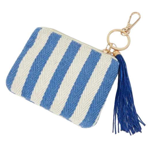 Blue and white striped nautical coin purse featuring a blue tassel, zipper closure and gold-tone keychain clip.
