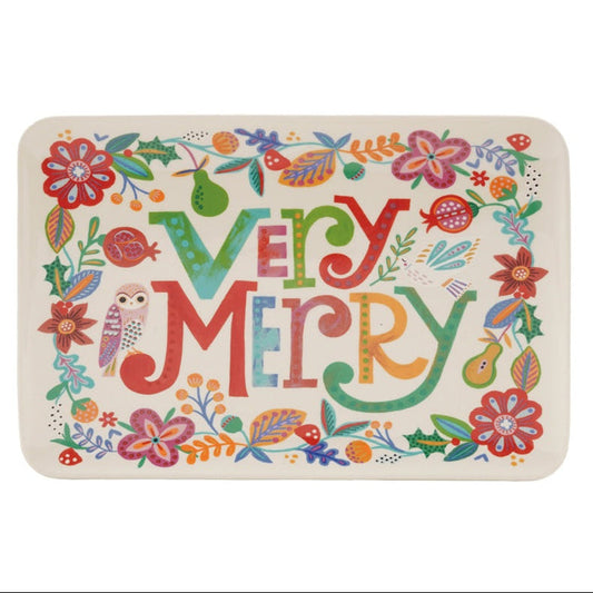 Rectangular stoneware platter with colorful “Very Merry” lettering, festive botanicals, fruit, mushrooms, and an owl.