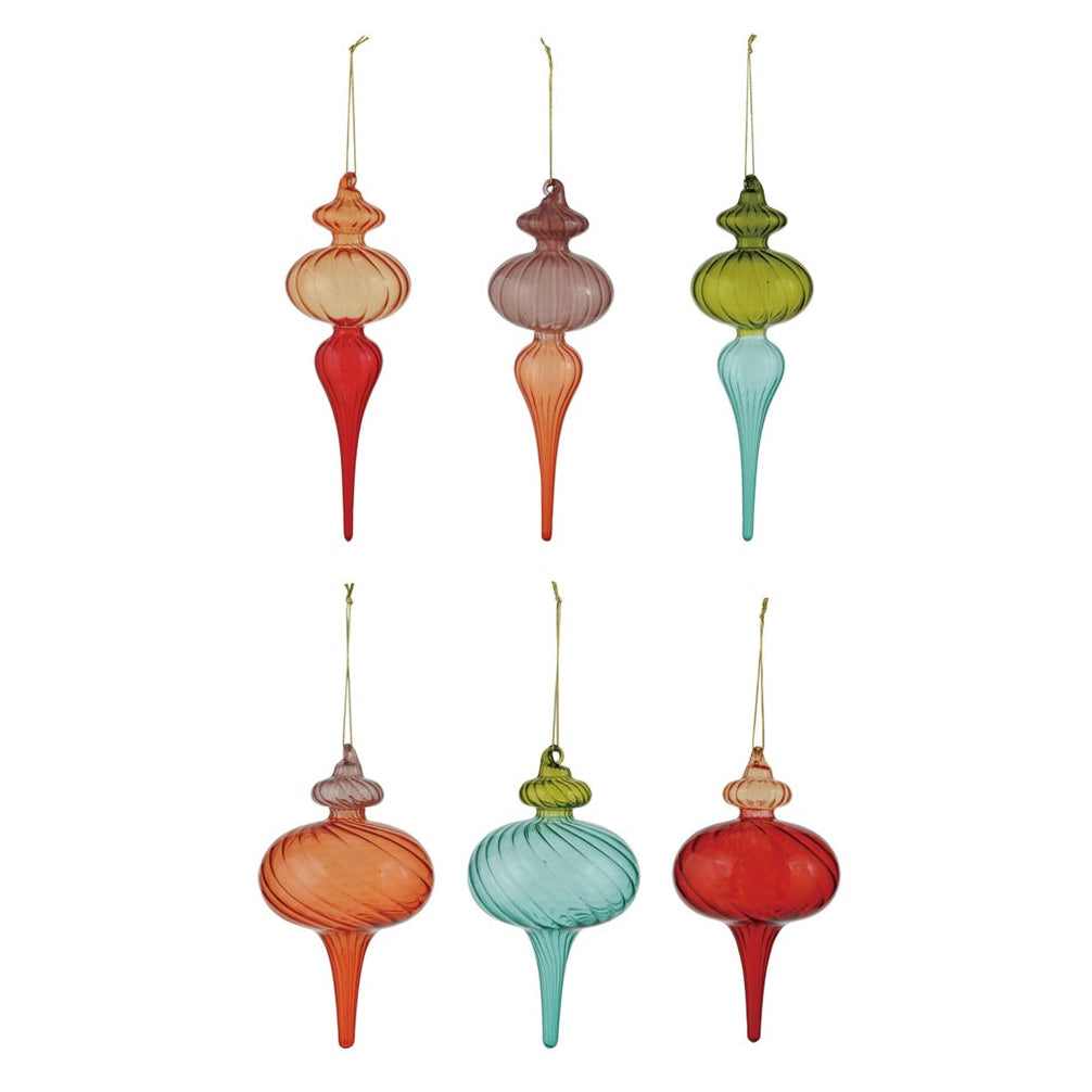 Set of colorful glass Christmas ornaments on a white background