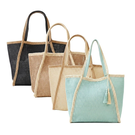 Four woven tote bags in black, beige, and two shades of green on a white background