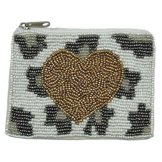 Beaded pouch with a gold heart design on a white background