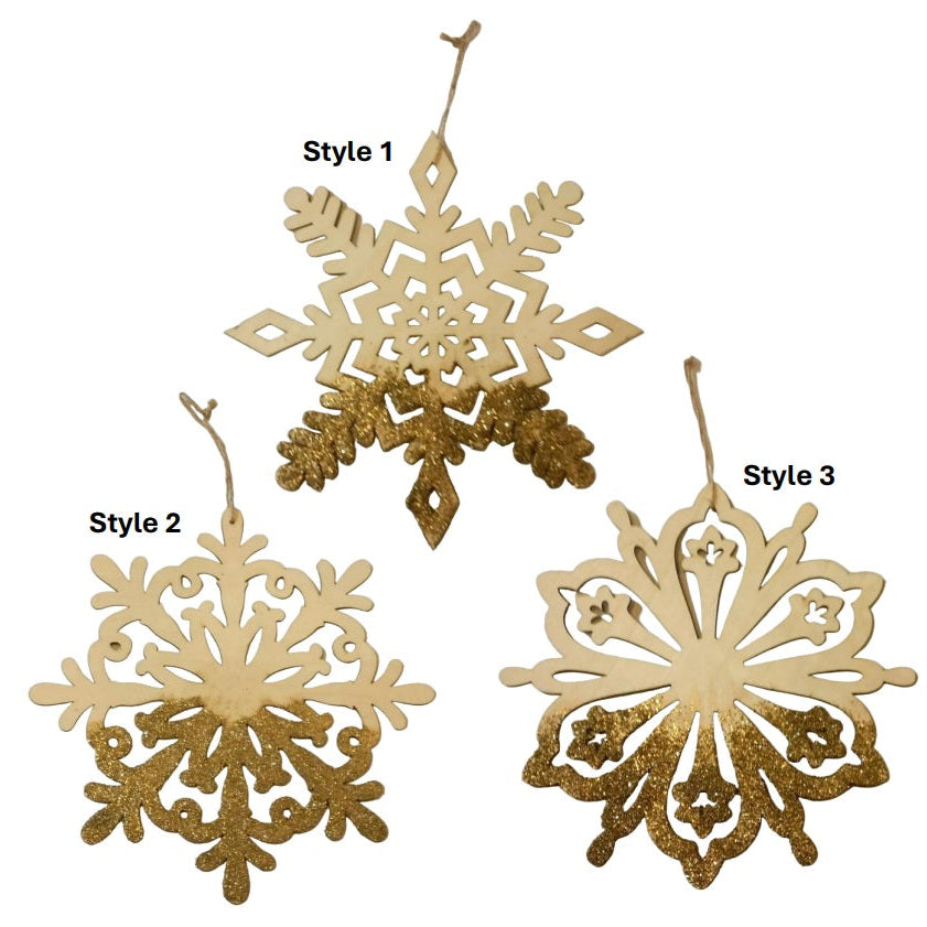 Set of large wooden snowflake Christmas tree ornaments with gold glitter—festive, elegant décor perfect for holiday sparkle.